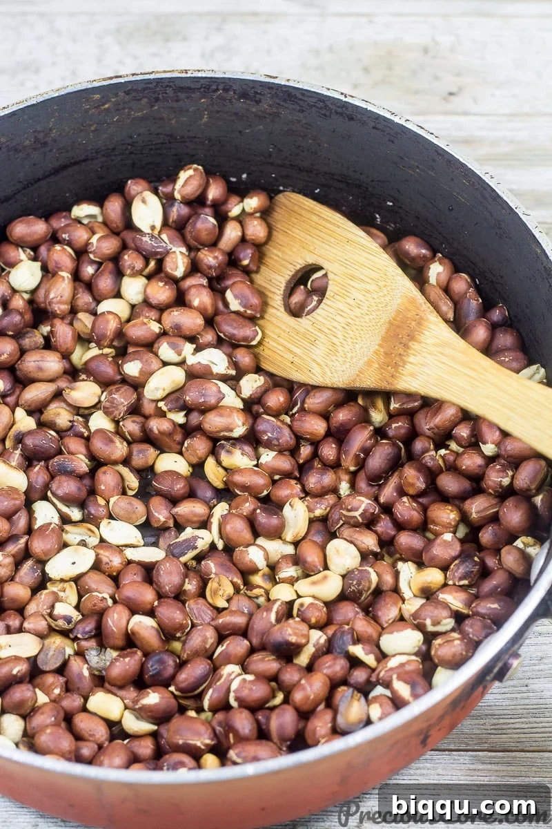 Groundnut Paste Step 1: Roasting peanuts in a pan.