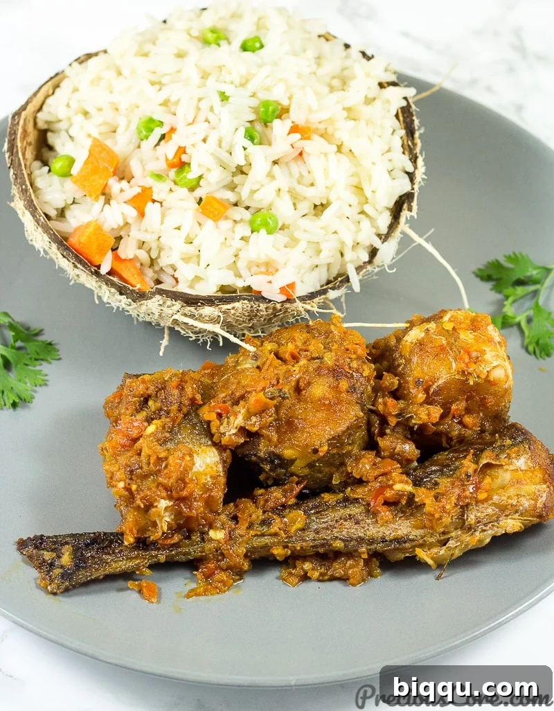 Effortless Coconut Rice 7 Coconut rice served with peppered fish, a delicious combination