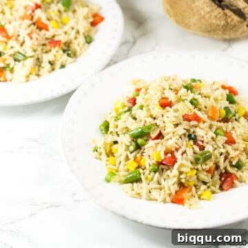White bowls of coconut fried rice.