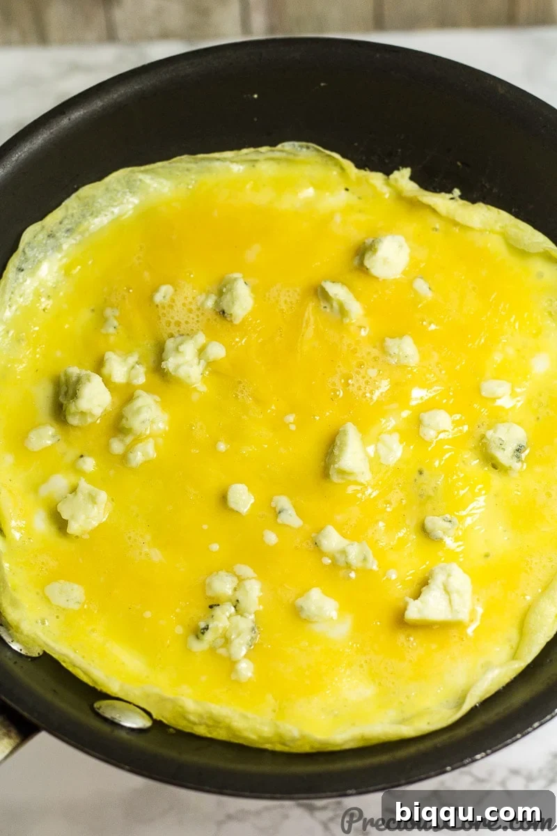 How to make an omelet with cheese - step 3