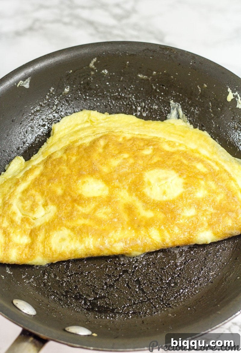 How to make an omelet with cheese - step 4