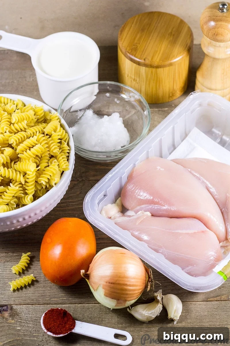Ingredients for Macaroni and Chicken dinner recipe: pasta, chicken, cream, vegetables, and seasoning