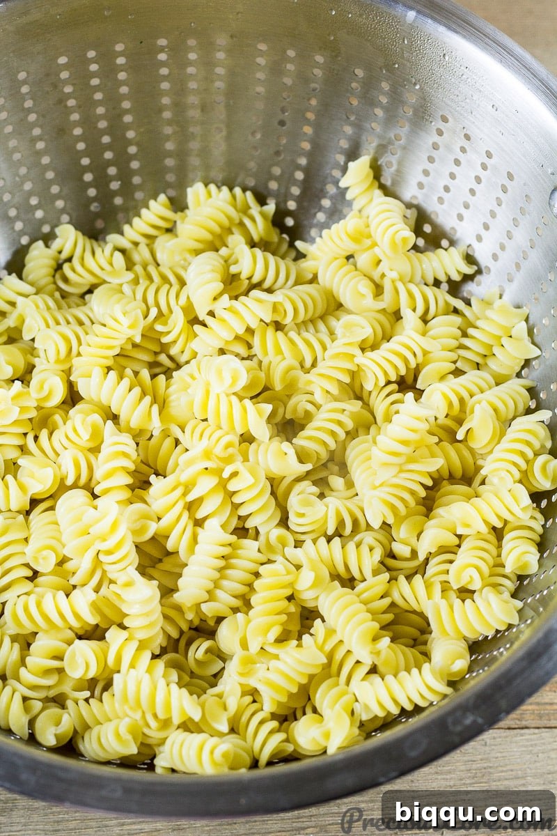 Macaroni and Chicken dinner recipe step 1: boiling pasta and reserving water