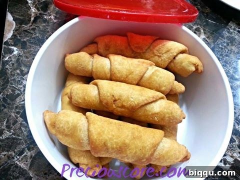 Golden brown crispy African fish rolls ready to be enjoyed