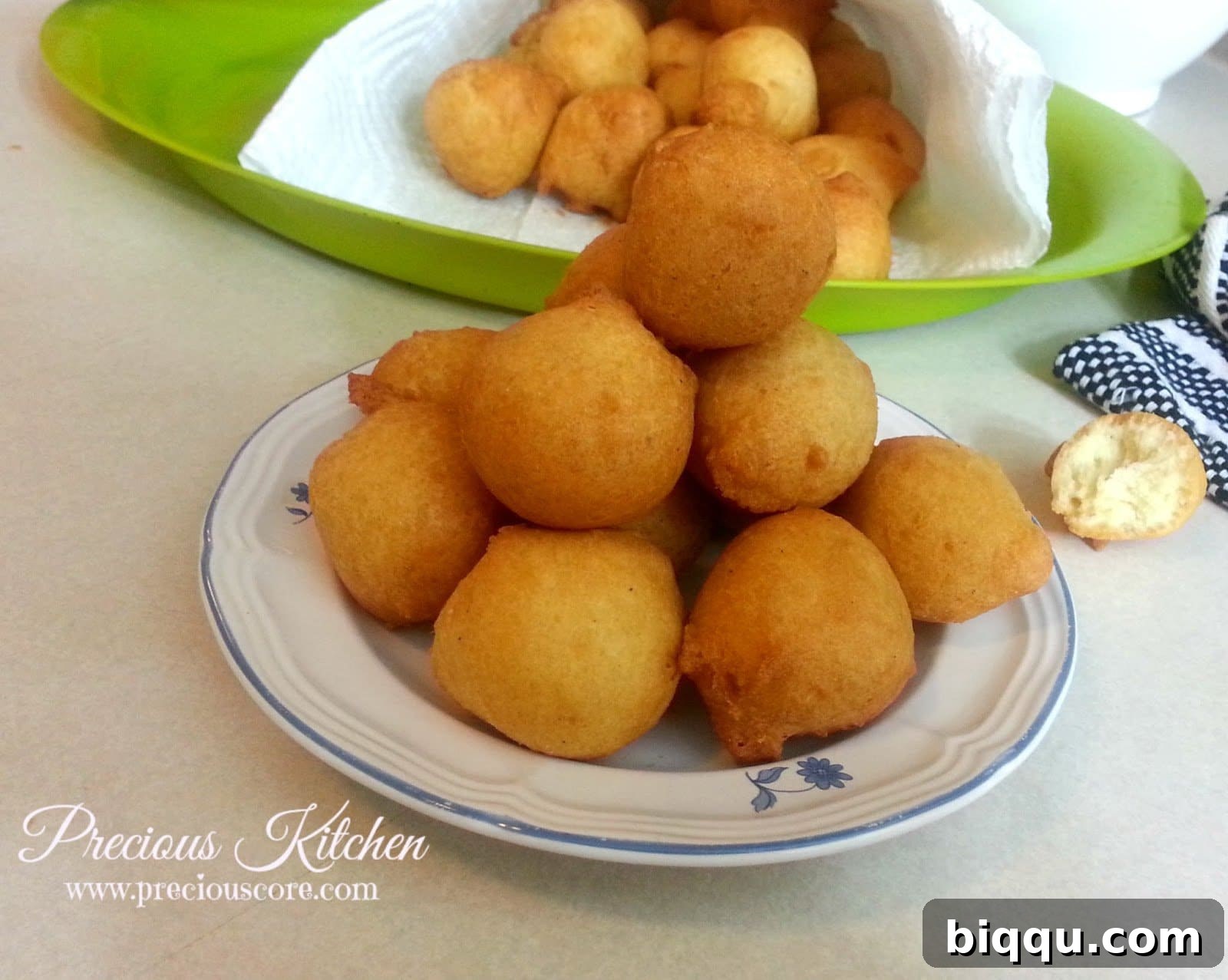 Freshly made fluffy African drop doughnuts dusted with sugar