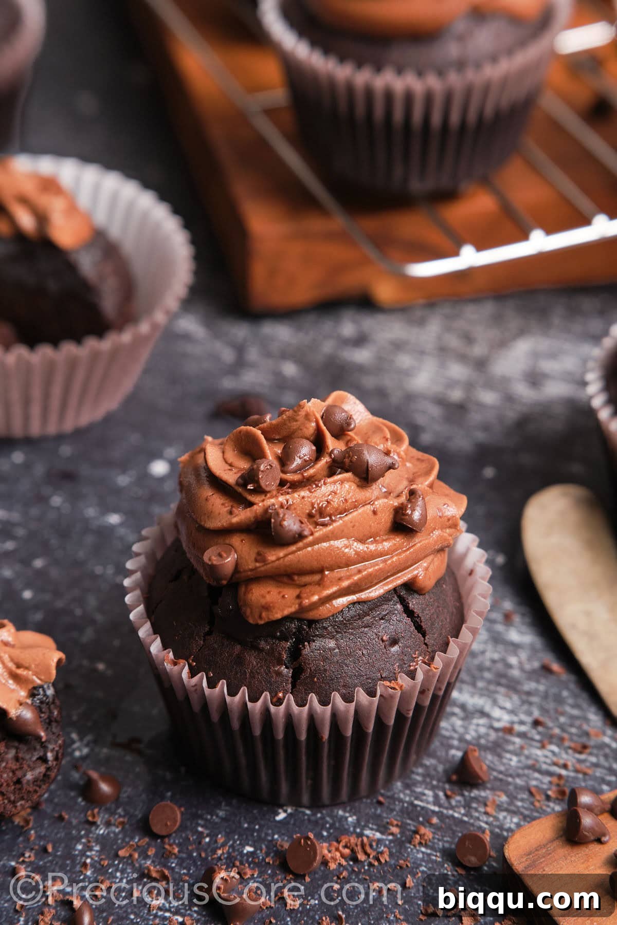 Baking tools and ingredients laid out for making easy chocolate cupcakes, emphasizing preparation.