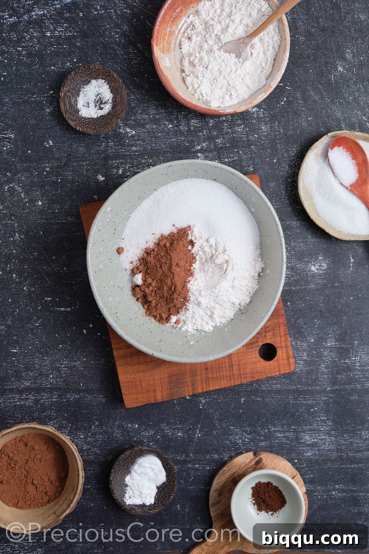 Dry ingredients for chocolate cupcakes measured out in a bowl.