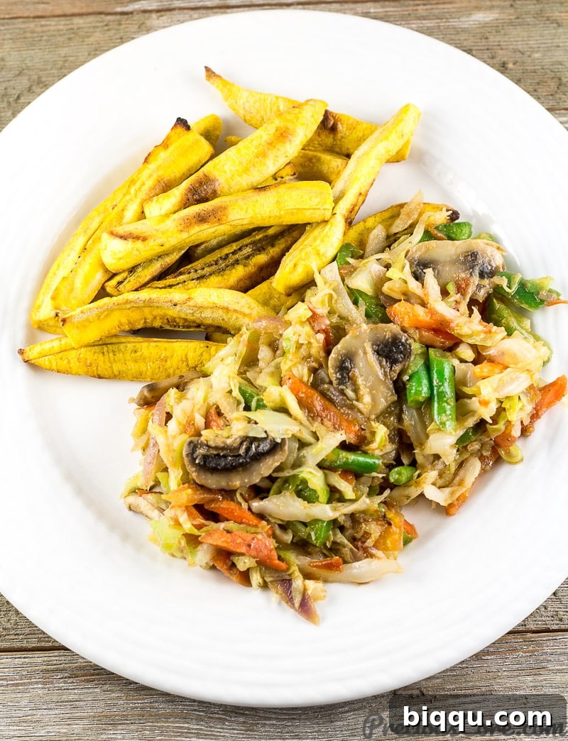 Cameroon Cabbage stew and plantains. Mixed vegetables with cabbage, a delicious and wholesome vegan meal.