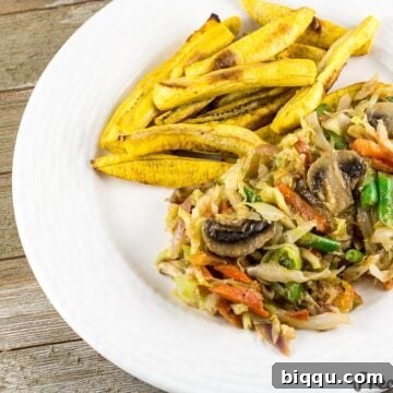 Cameroonian Cabbage Stew served with baked plantain fries.