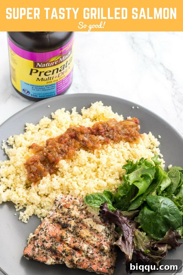 Plate of food with a bottle of Nature Made prenatal vitamins with text \"Super Tasty Grilled Salmon So good!\"
