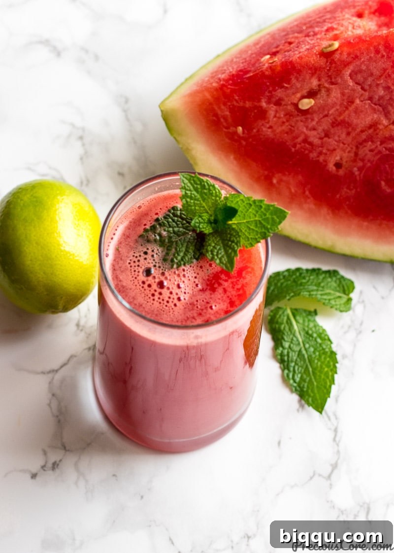 Homemade watermelon mint juice being poured