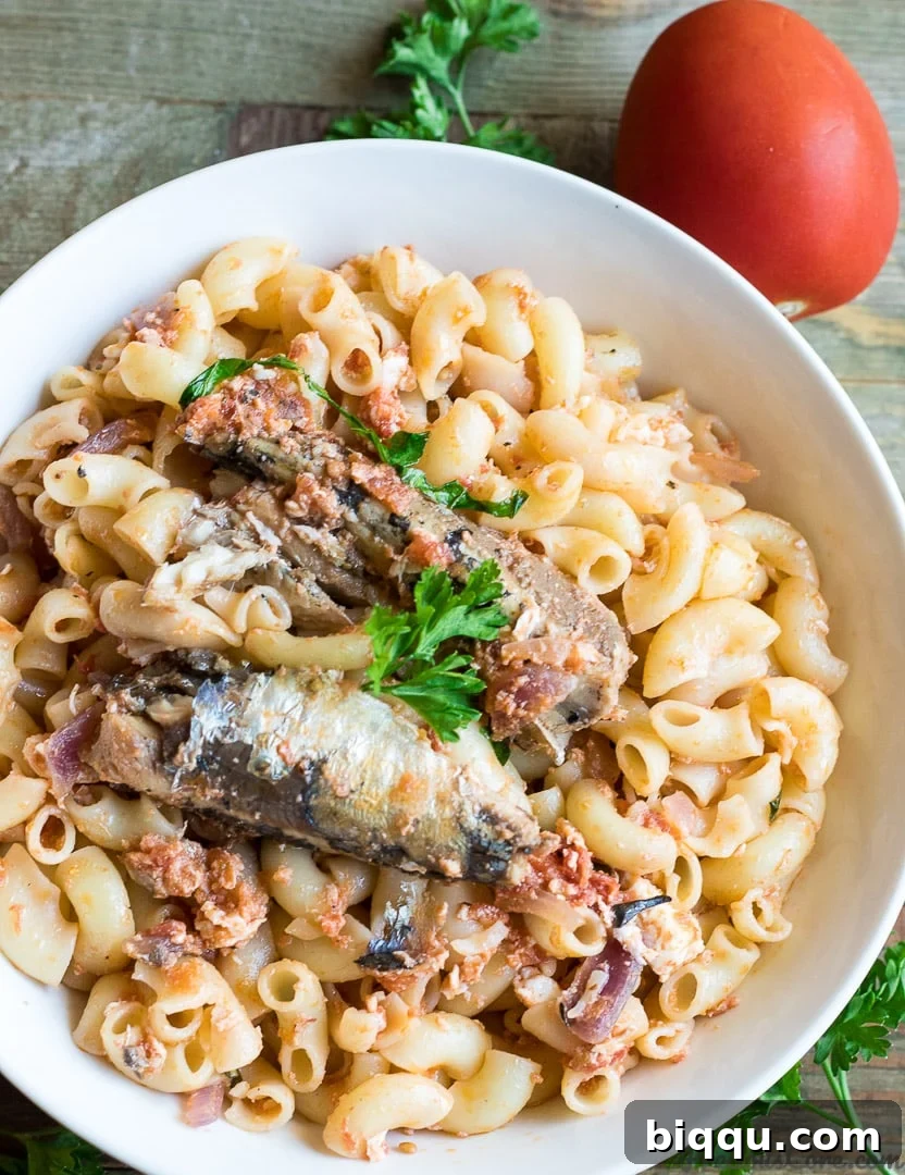 African-style macaroni pasta with flavorful sardines in a simple tomato sauce, a quick, kid-friendly, and delicious one-pot meal.