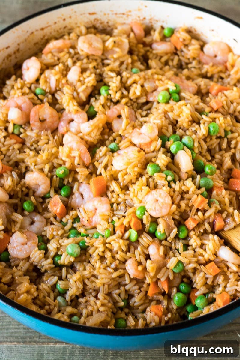 Authentic African Jollof Rice cooked to perfection with tender shrimp