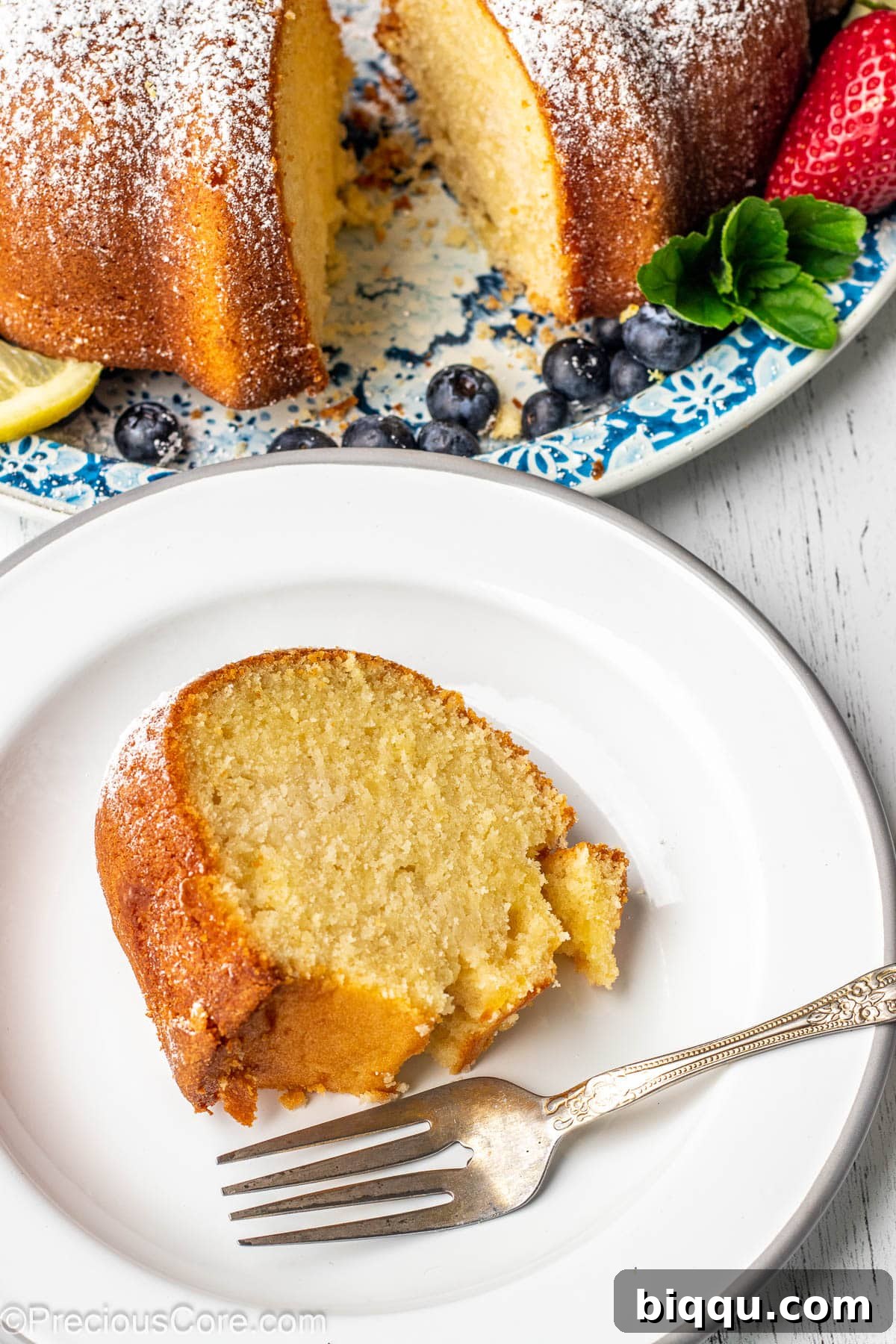 Slice of cake on a white plate.
