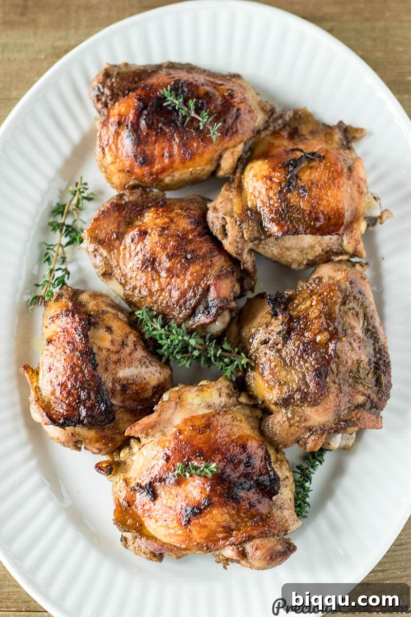 Grilled Jerk Chicken with Wet Marinade on a plate, showcasing the delicious Caribbean flavors