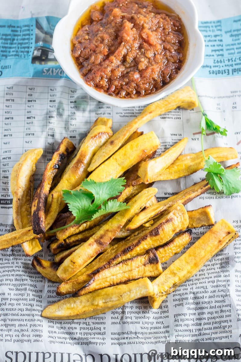 Healthy Baked Plantain Fries served alongside a flavorful African Pepper Sauce, ideal for dipping
