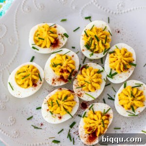 Platter of decorated deviled eggs.
