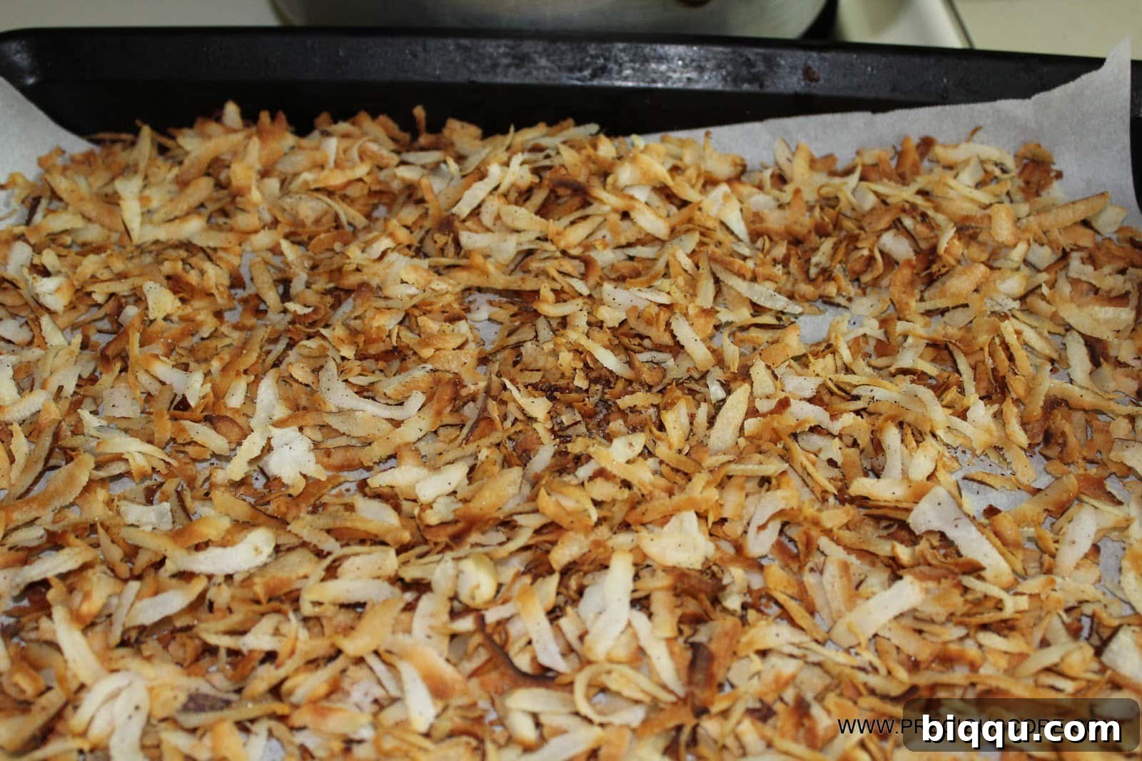 Homemade toasted coconut sweet, a popular Cameroonian snack.