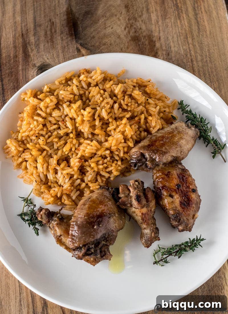 Jerk chicken on a plate and rice