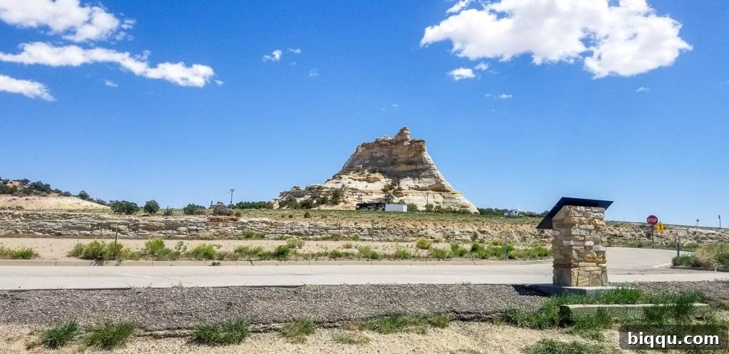 A pristine white hill under a clear blue sky, showcasing the vastness of nature.