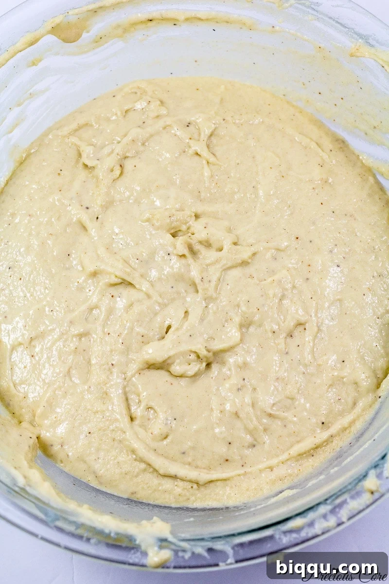 Cameroon doughnuts batter showing its ideal dripping consistency.