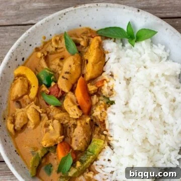 coconut curry chicken and rice in a bowl