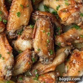 Garlic Butter Wings in a white dish.