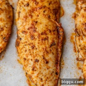 Close-up of juicy baked chicken.