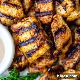 Chicken nuggets with grill marks.